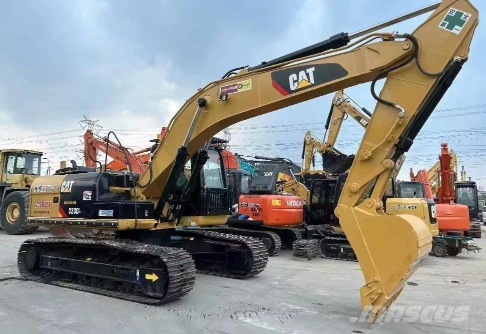 CAT 323 D Pásová rýpadla