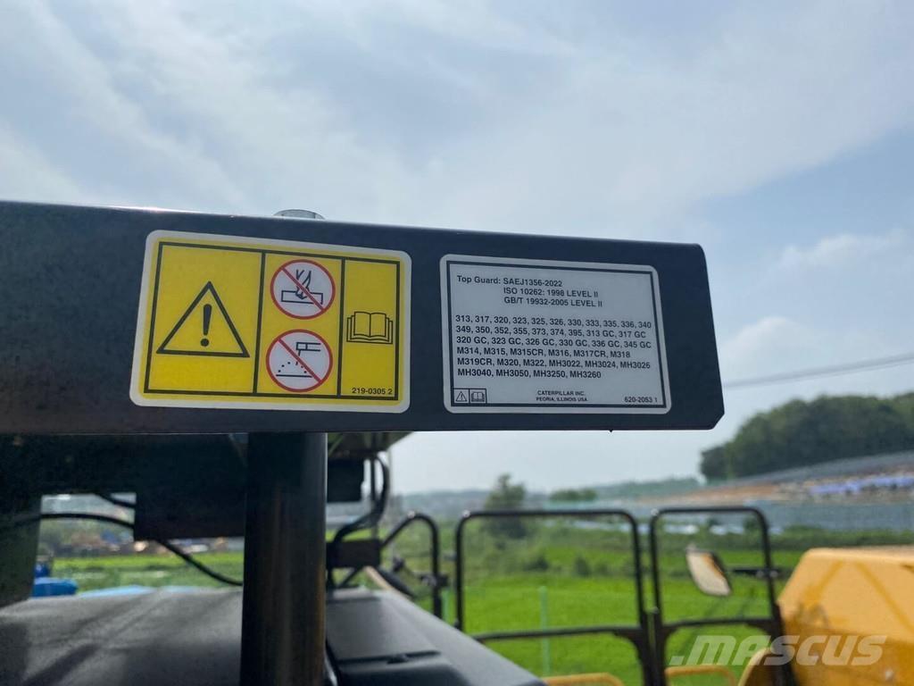 CAT 352 UHD Pásová rýpadla