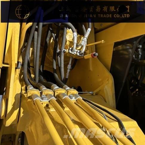 Komatsu PC 210 Pásová rýpadla