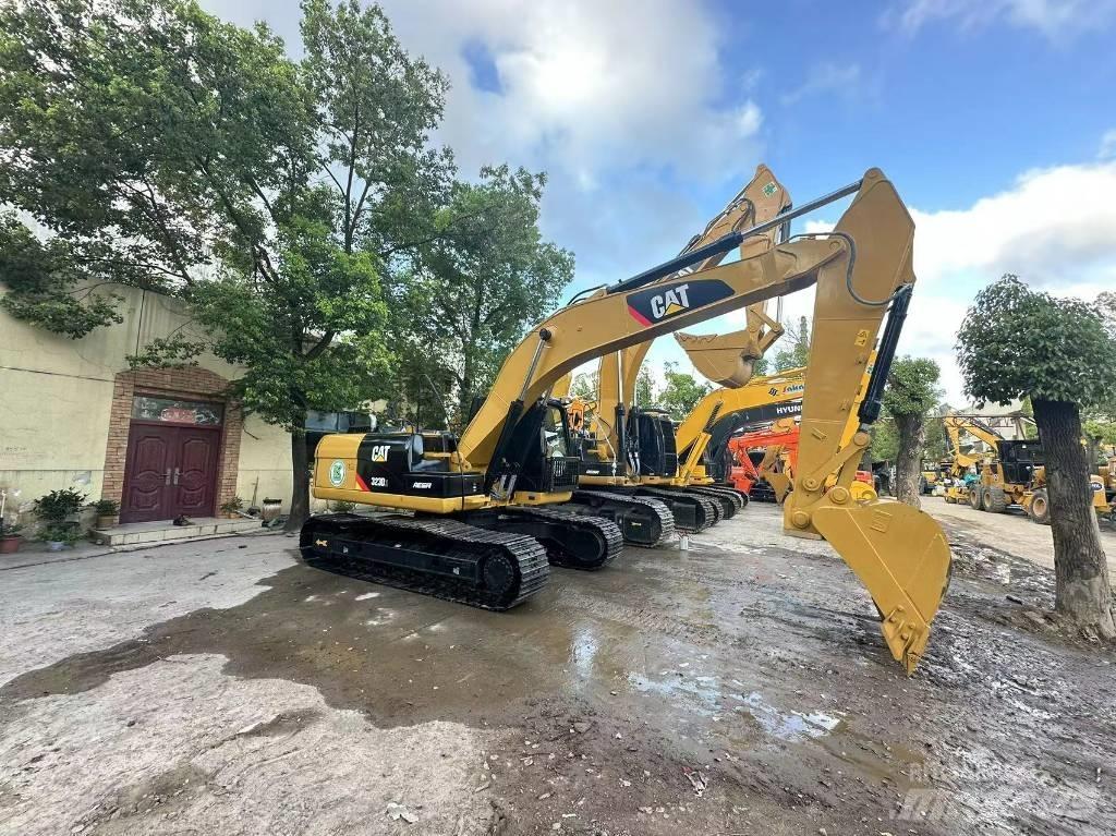 CAT 323 D Pásová rýpadla