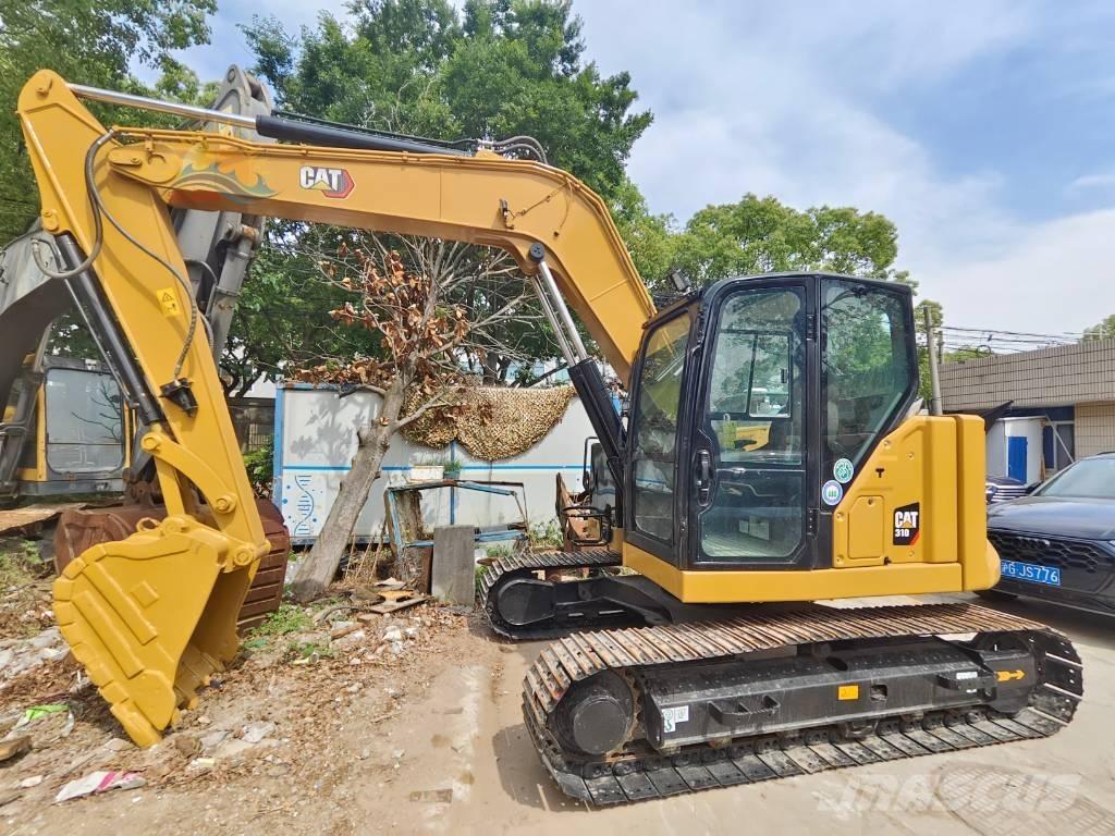 CAT 310 Pásová rýpadla