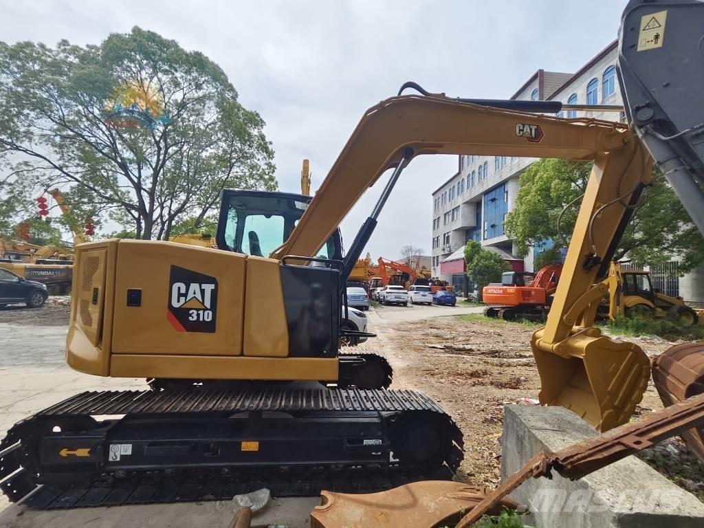CAT 310 Pásová rýpadla