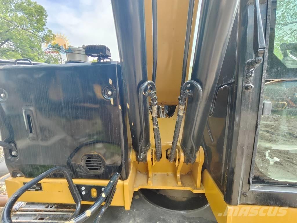 CAT 310 Pásová rýpadla