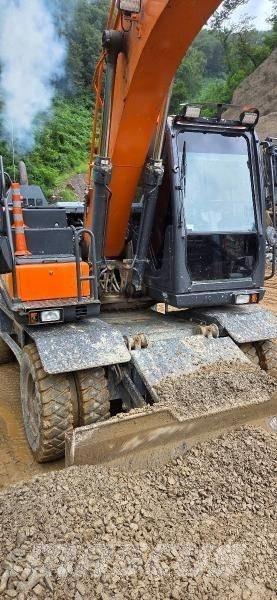 Doosan D 140W-5 Kolová rýpadla
