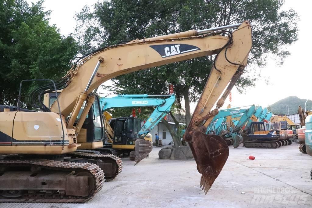 CAT 320BU Pásová rýpadla