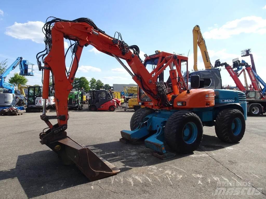 Mecalac 12MXT Kolová rýpadla