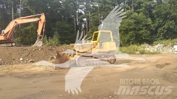John Deere 855 Pásové nakladače
