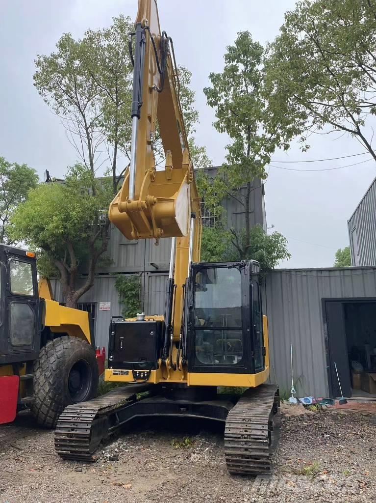 CAT 310 Pásová rýpadla