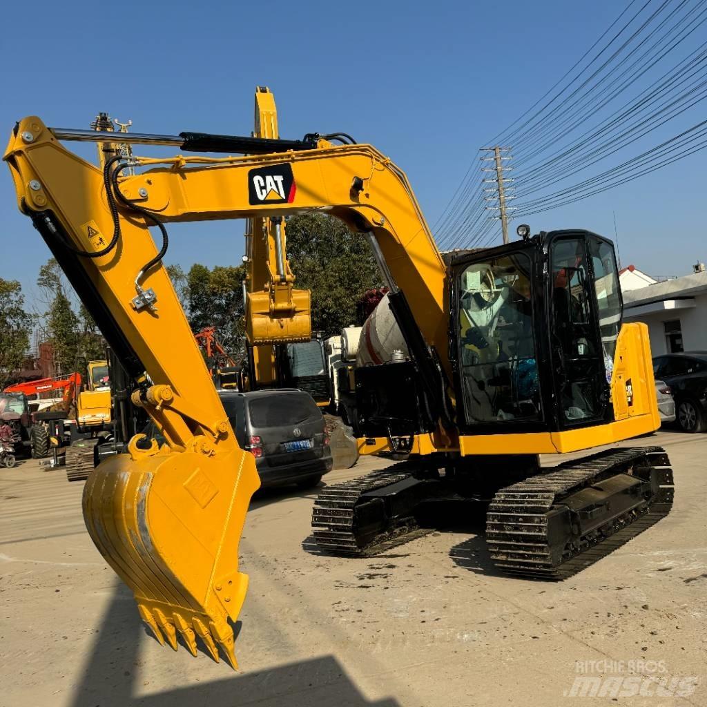 CAT 310 Pásová rýpadla