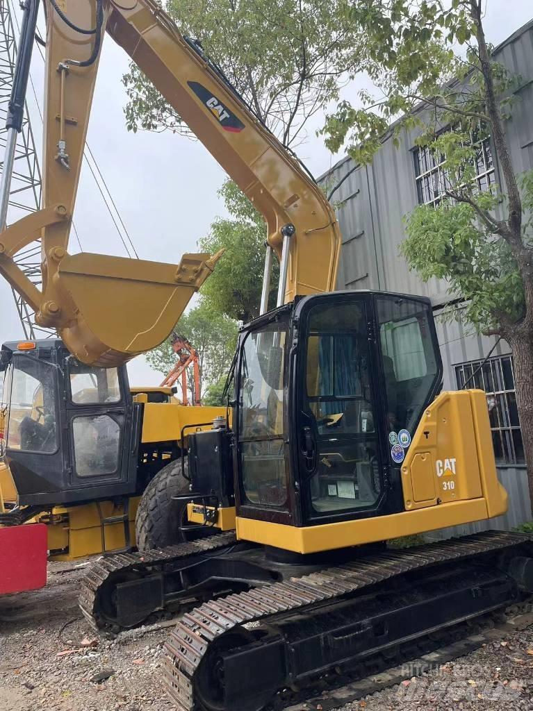 CAT 310 Pásová rýpadla