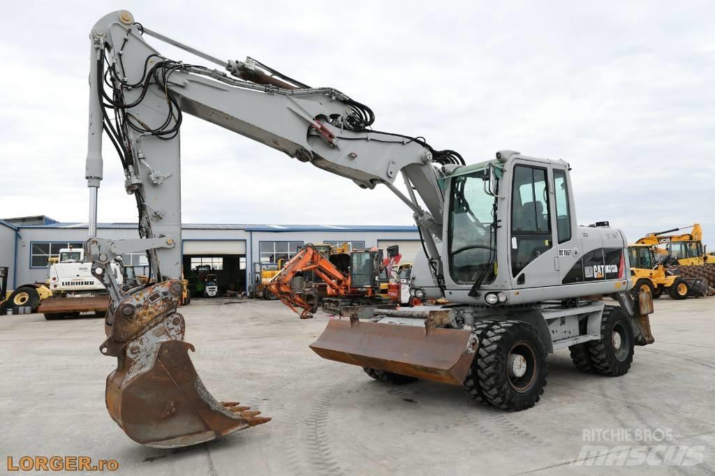 CAT M 313 D Kolová rýpadla
