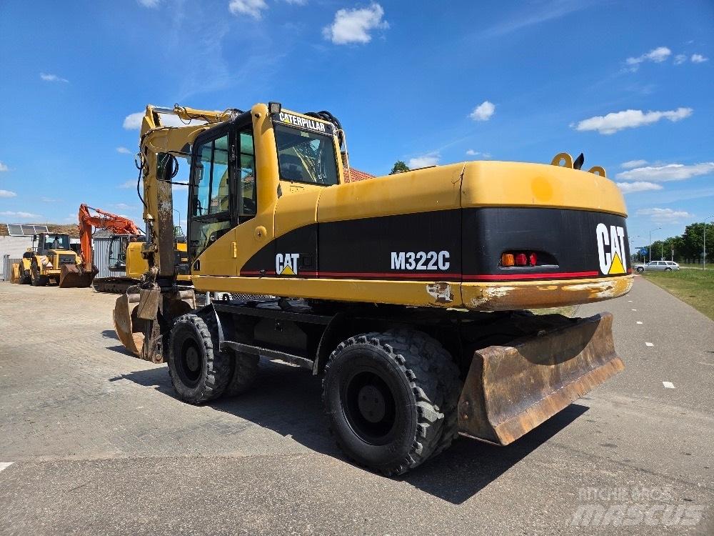 CAT M322C Kolová rýpadla