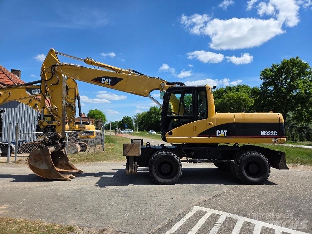 CAT M322C Kolová rýpadla
