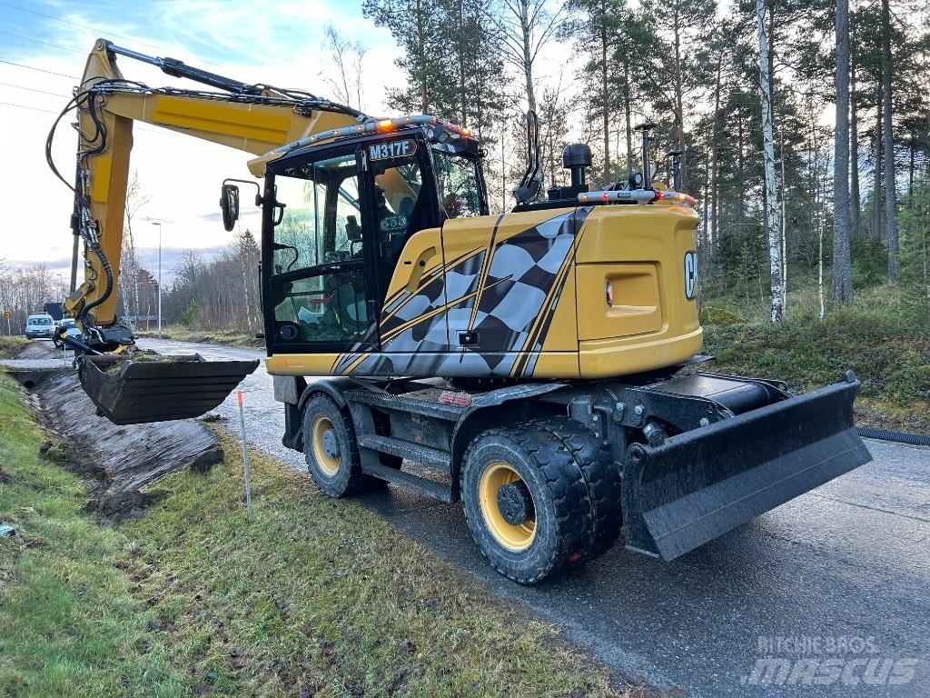 CAT M 317F Kolová rýpadla