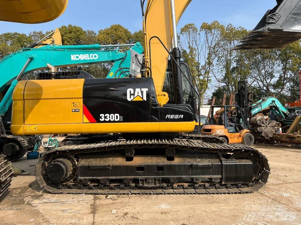 CAT 330 Pásová rýpadla