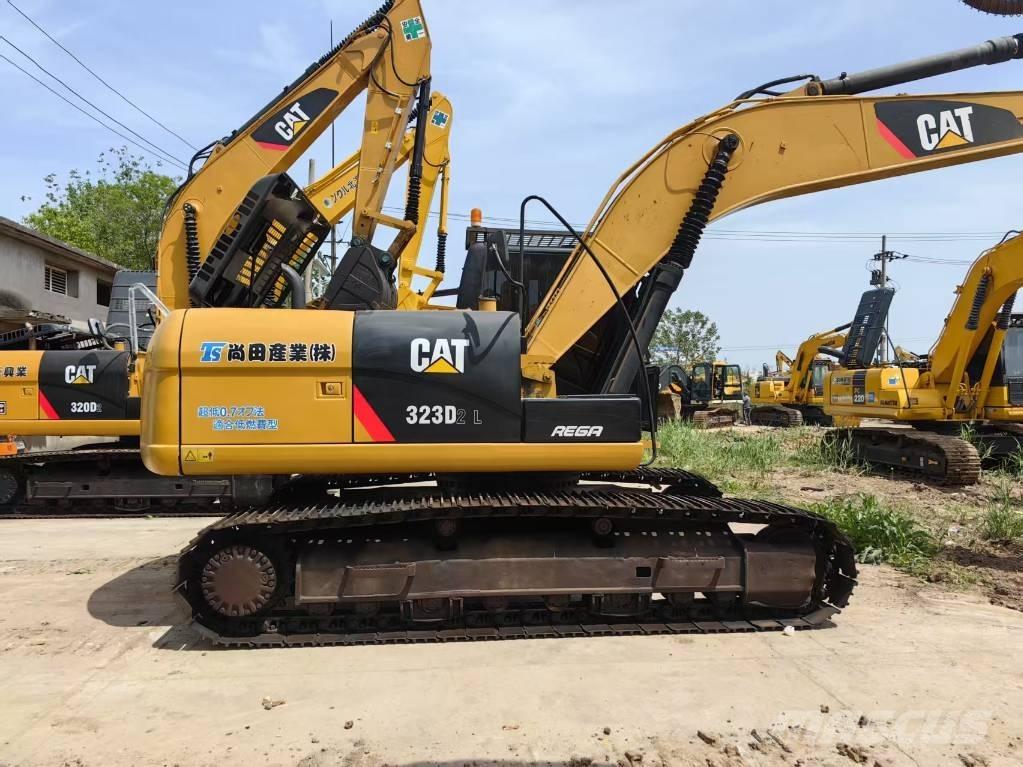 CAT 323 D Pásová rýpadla