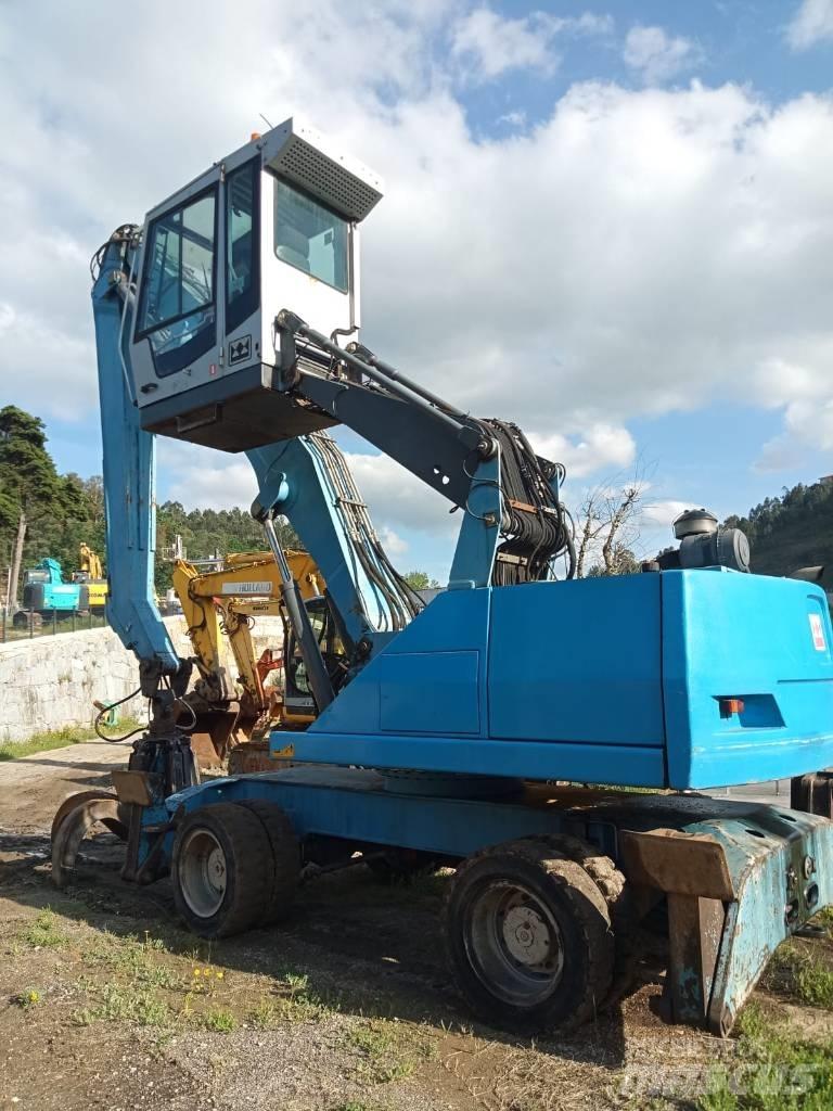 Fuchs MHL 331 Stroje pro manipulaci s odpadem