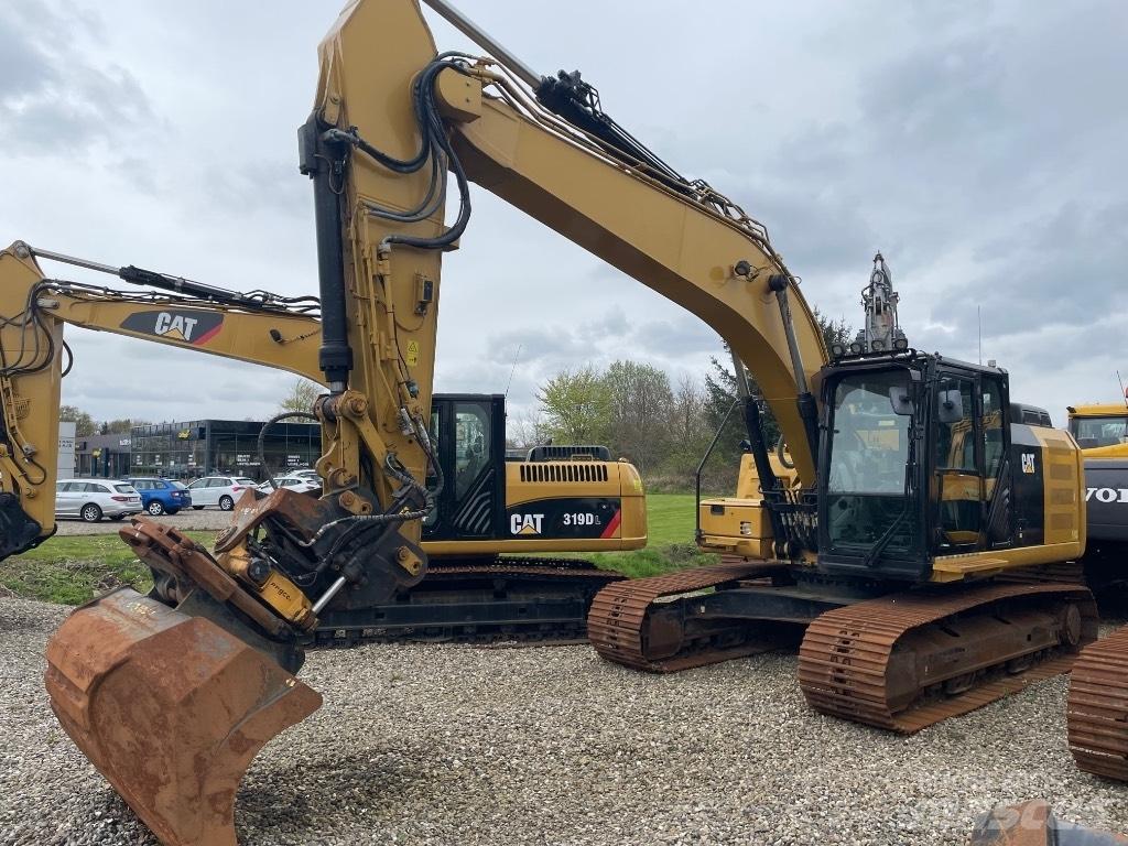 CAT 323FL Pásová rýpadla