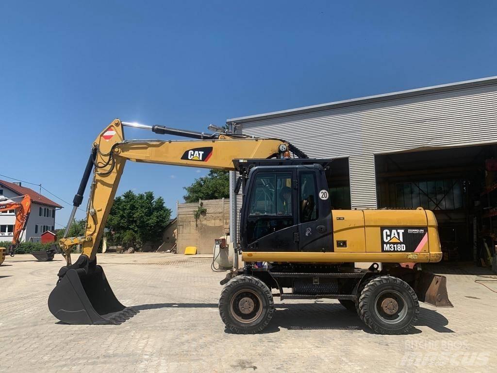 CAT M 318 D Kolová rýpadla