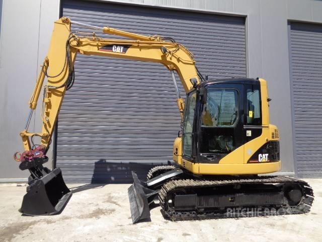 CAT 308 C CR Midi rýpadla 7t - 12t
