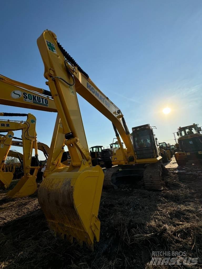 Komatsu PC 210 Pásová rýpadla