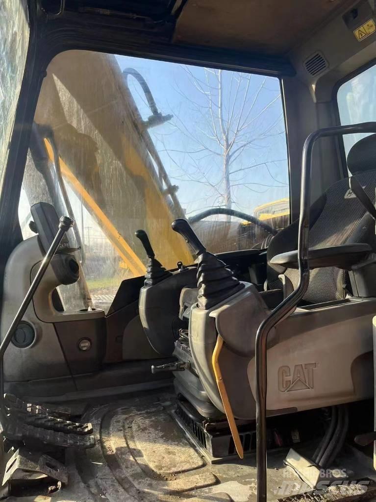 CAT 312d Pásová rýpadla