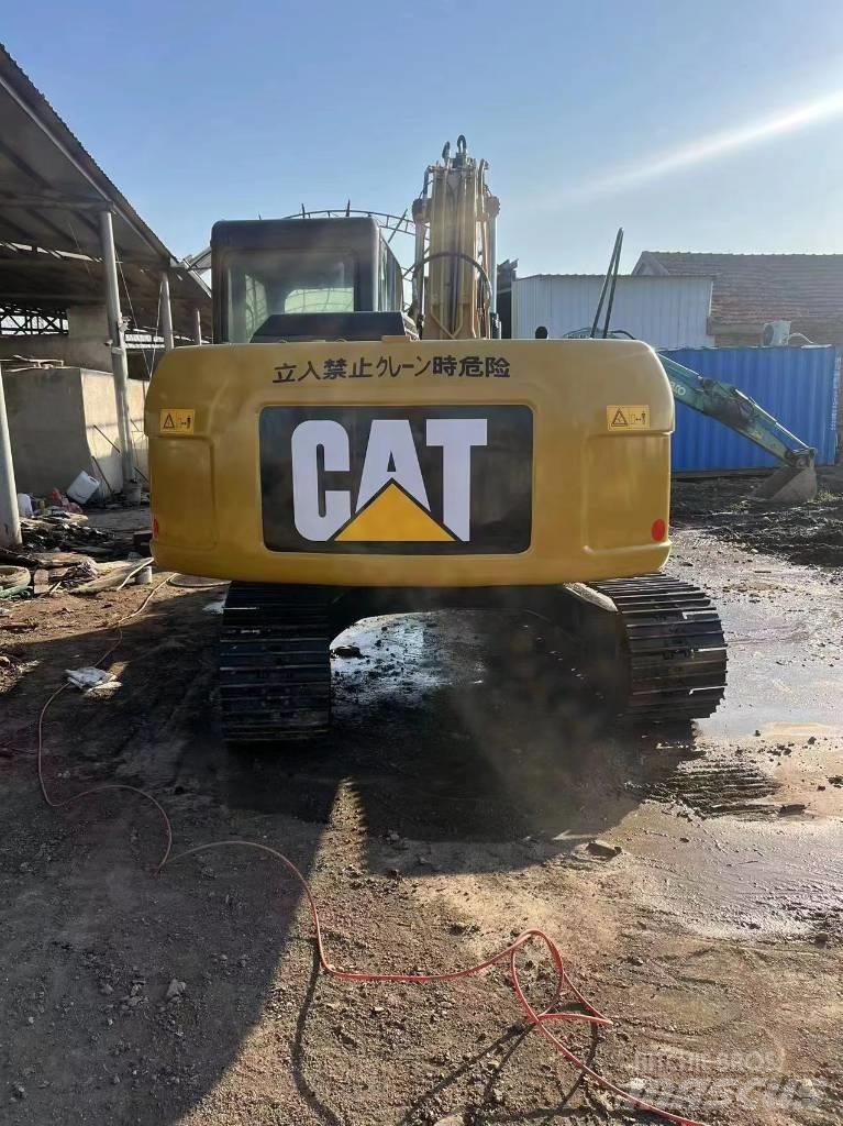 CAT 312d Pásová rýpadla