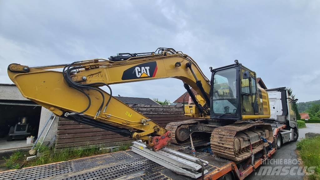CAT 318 FL Pásová rýpadla