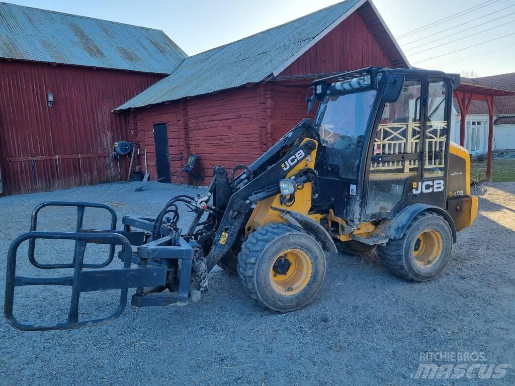 JCB 403 Smykem řízené nakladače
