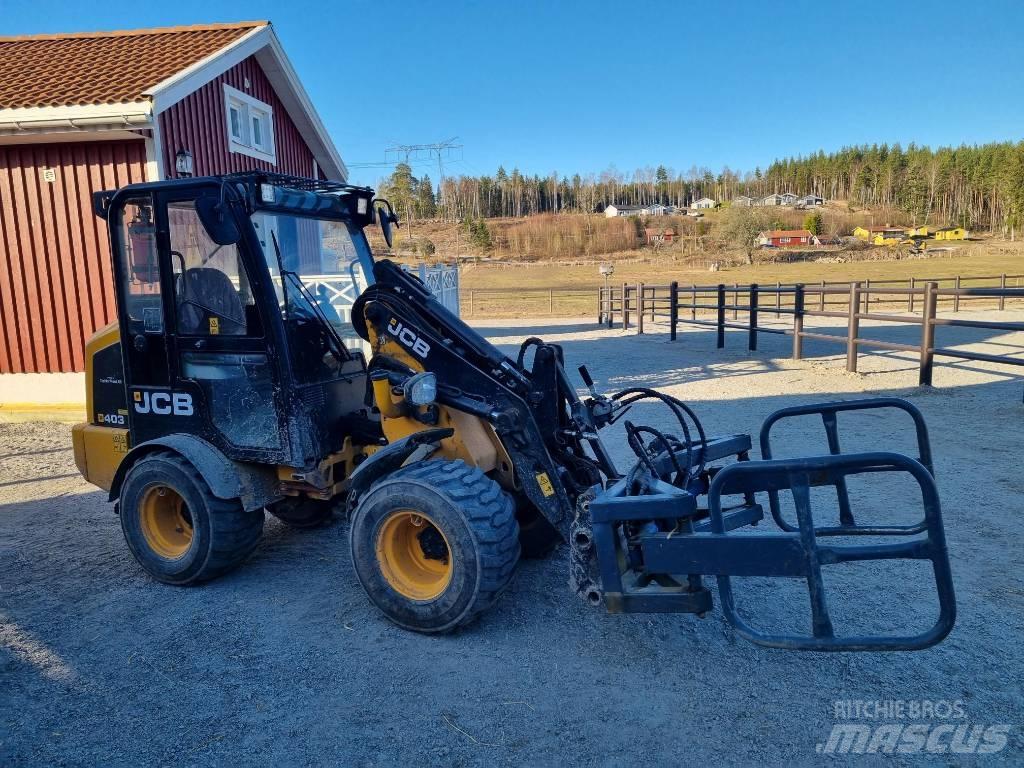 JCB 403 Smykem řízené nakladače