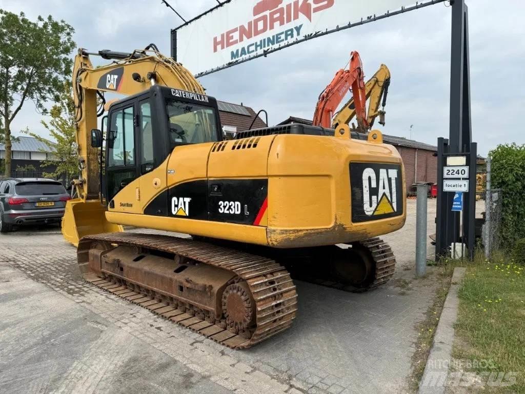 CAT 323DL (320DL) Pásová rýpadla