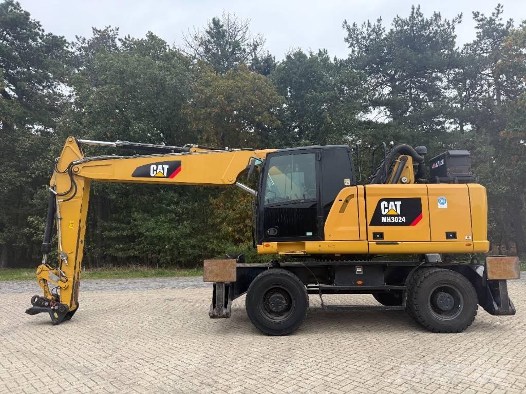 CAT MH 3024 Kolová rýpadla
