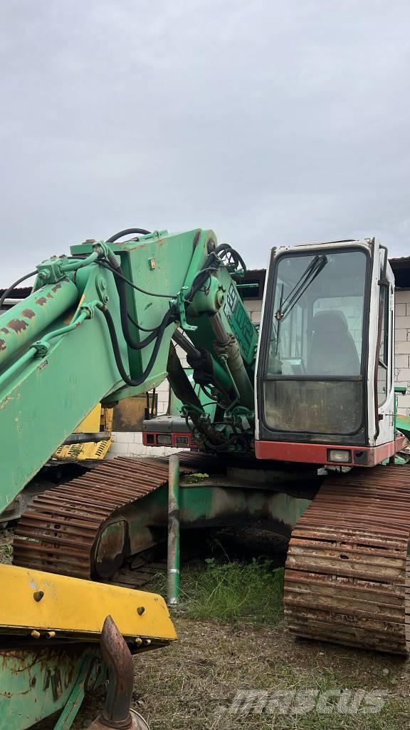 Liebherr 902 Pásy, řetězy a podvozek