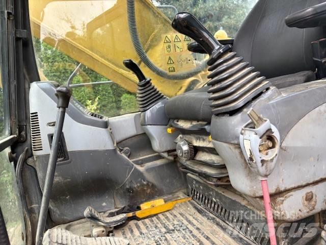 Komatsu PC 210 Pásová rýpadla