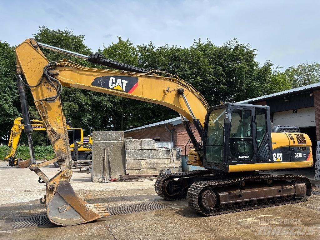 CAT 323 D LN Pásová rýpadla