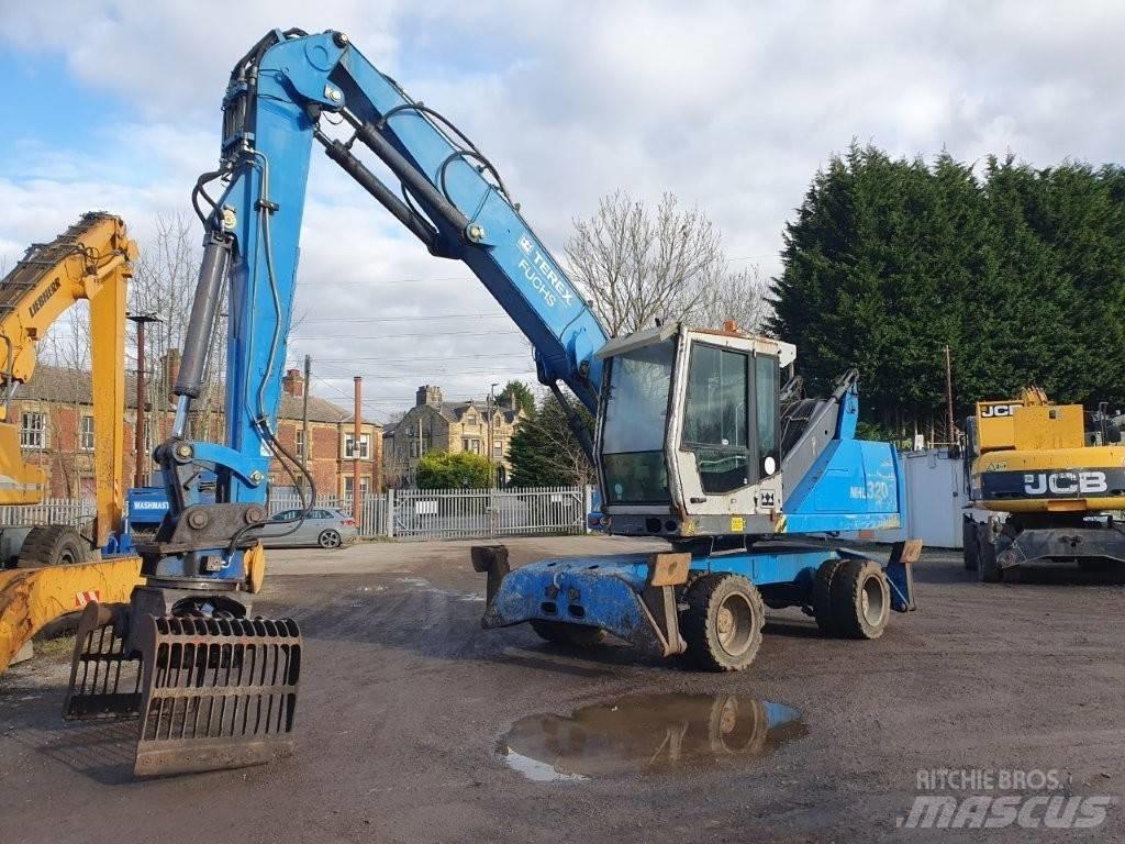 Fuchs MHL 320 Stroje pro manipulaci s odpadem