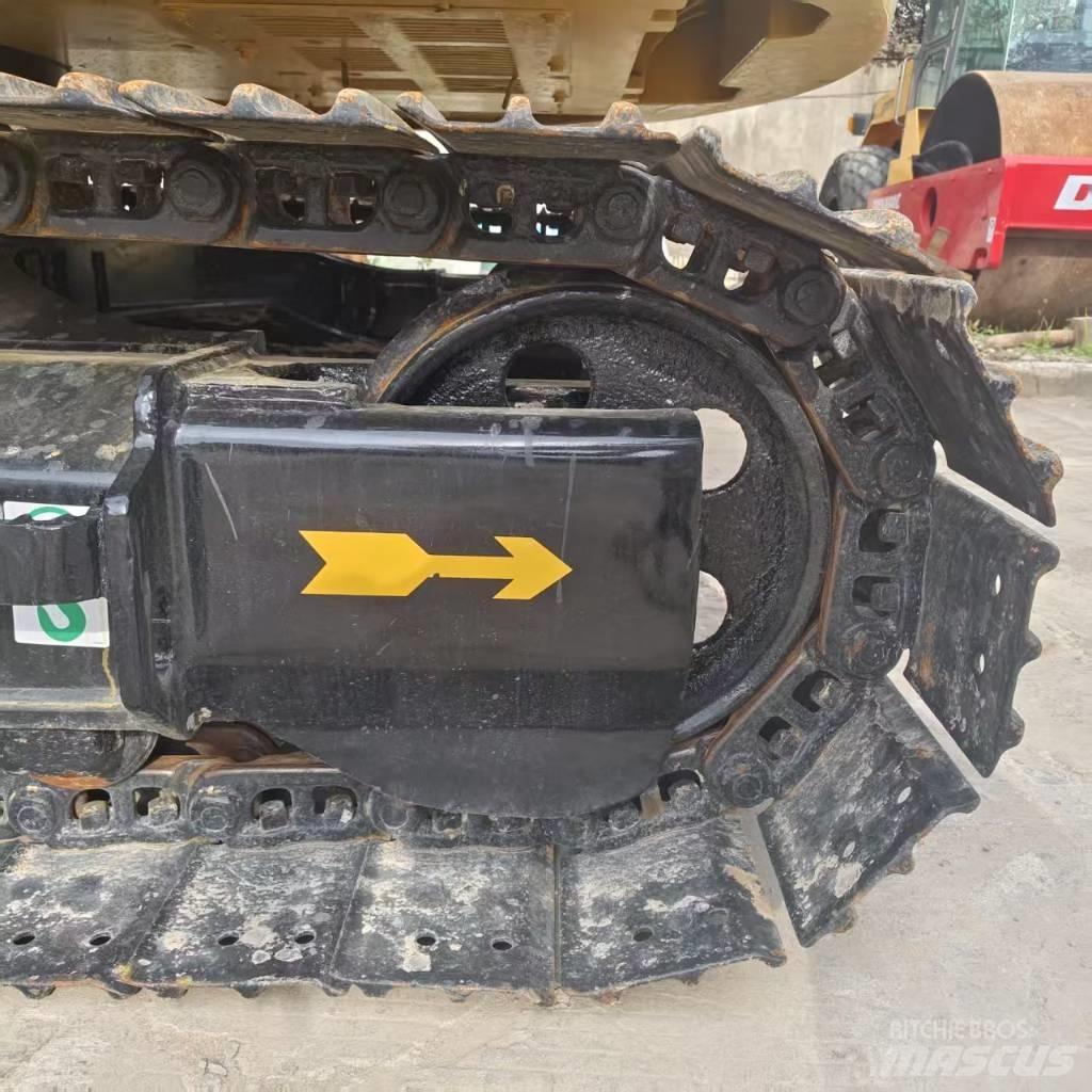 CAT 310 Pásová rýpadla