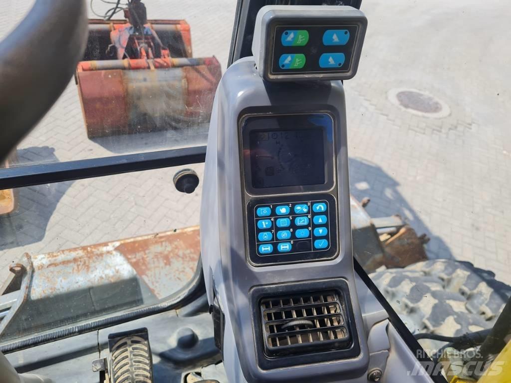 Komatsu PW 140-7 Kolová rýpadla