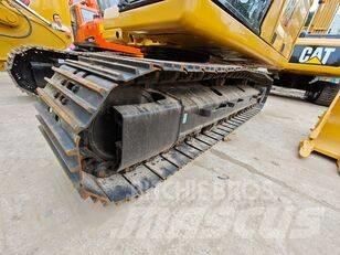 CAT 323 Pásová rýpadla