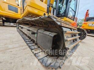 CAT 323 Pásová rýpadla