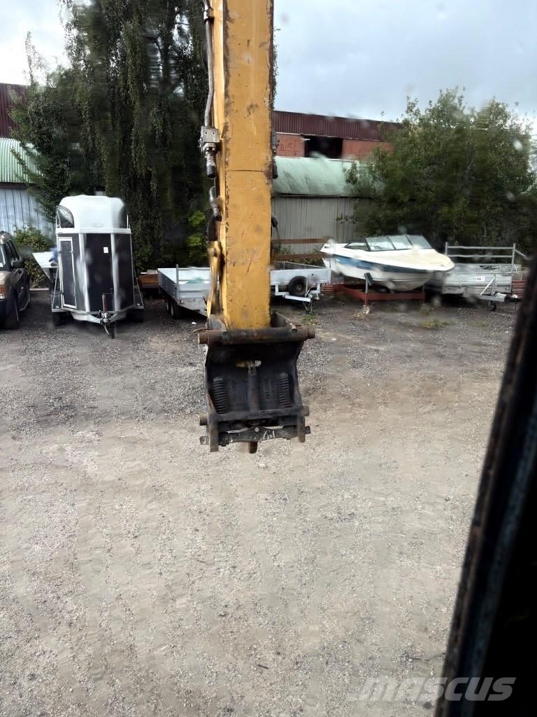 CAT M 313 D Mono Kolová rýpadla
