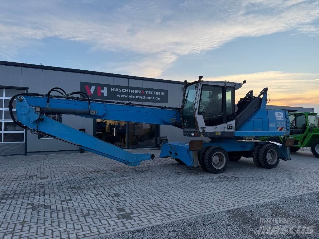 Fuchs MHL 331 Stroje pro manipulaci s odpadem
