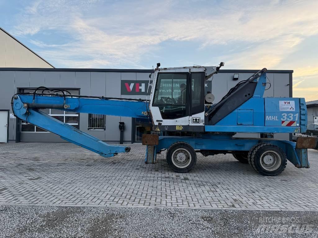 Fuchs MHL 331 Stroje pro manipulaci s odpadem