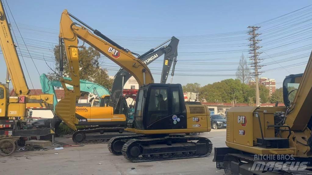 CAT 313 D Pásová rýpadla