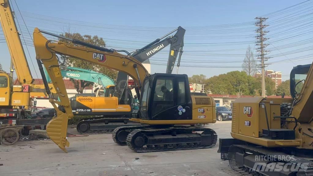 CAT 313 D Pásová rýpadla