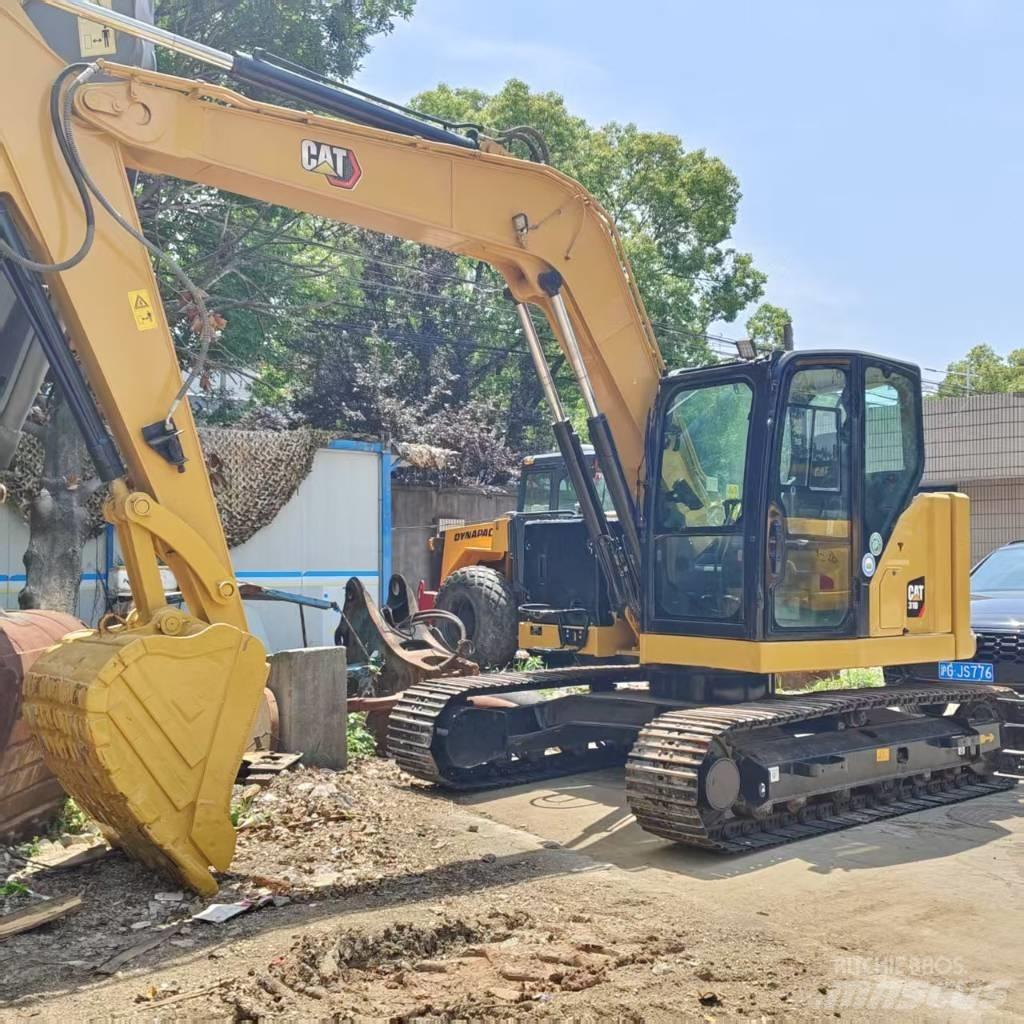 CAT 310 Pásová rýpadla