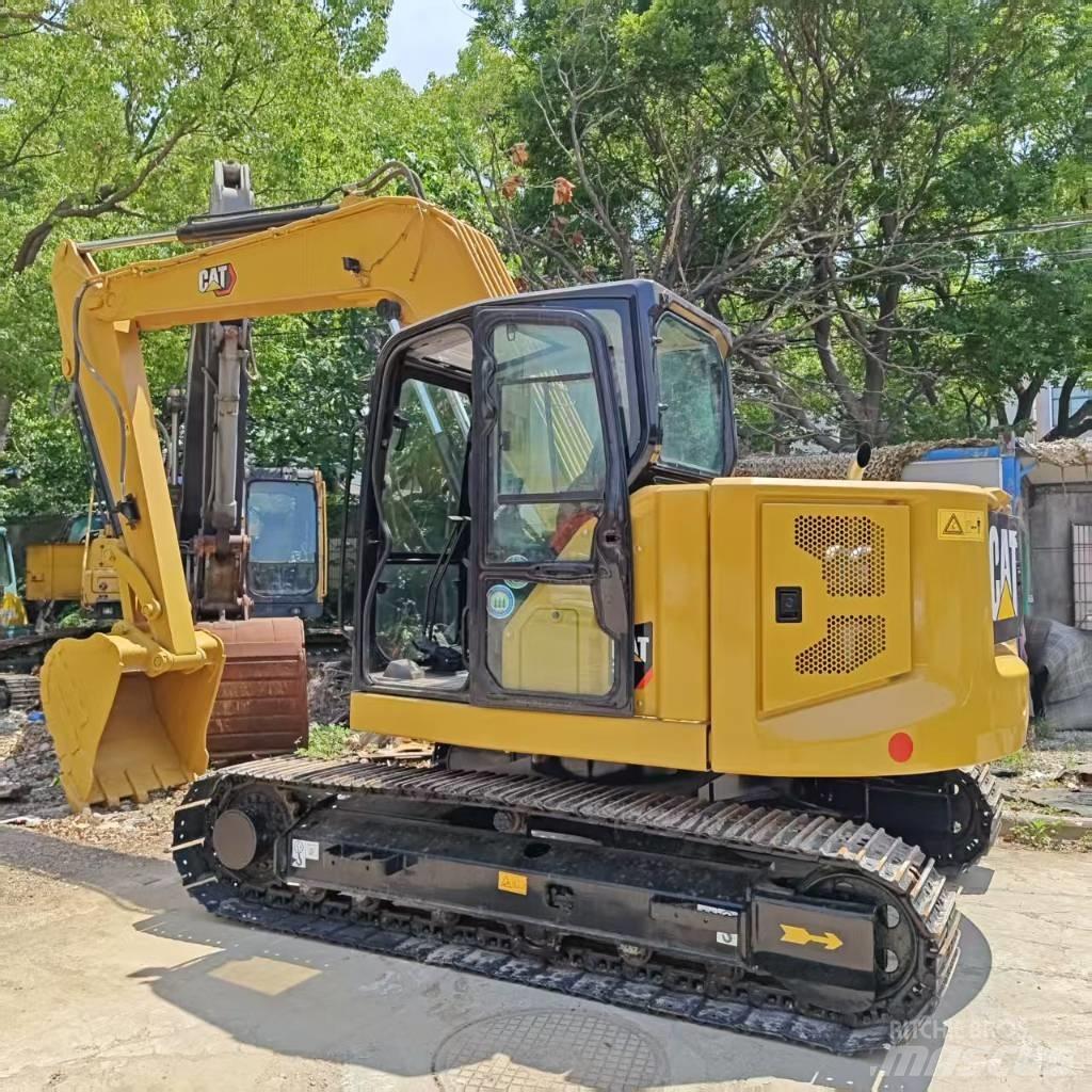 CAT 310 Pásová rýpadla