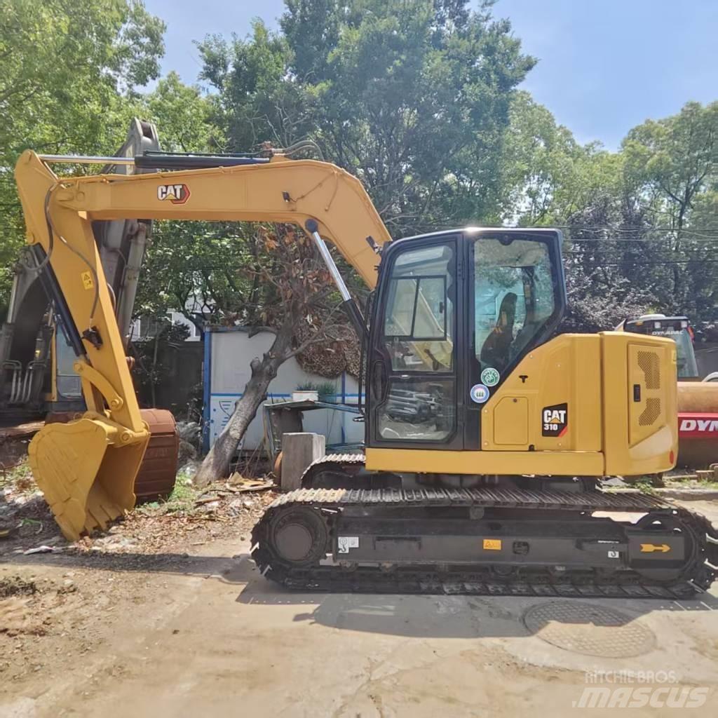 CAT 310 Pásová rýpadla