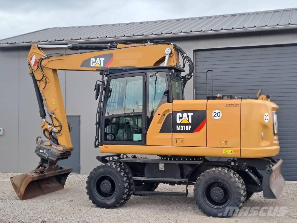 CAT M318F Kolová rýpadla