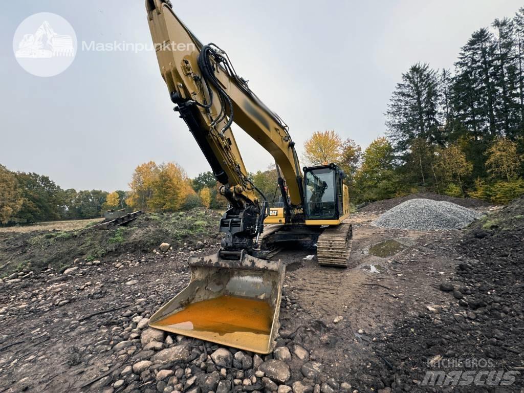 CAT 323 Pásová rýpadla